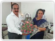 Dean Rajiv Gandhi Medical college Thane INDIA felicitates Dr Raj Harjani  December 2012